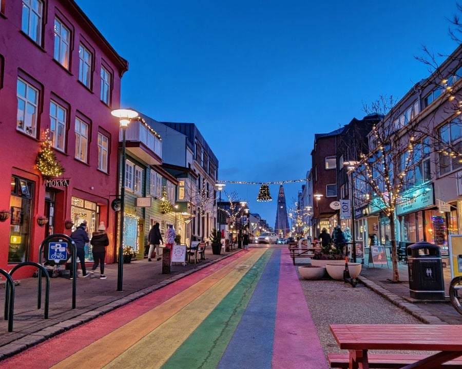 Rainbow street at dusk in Reykjavik, Iceland