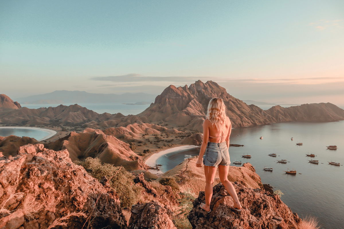 Traveller looking across view of the Komodo Islands, Indonesdia