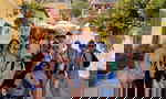 Group of travellers down street in Athens, Greece