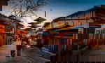 Kyoto street with geishas and temple