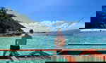 Solo travellers sat on boat in the Philippines