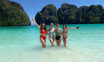 Travellers at Maya Bay in Koh Phi Phi, Thailand